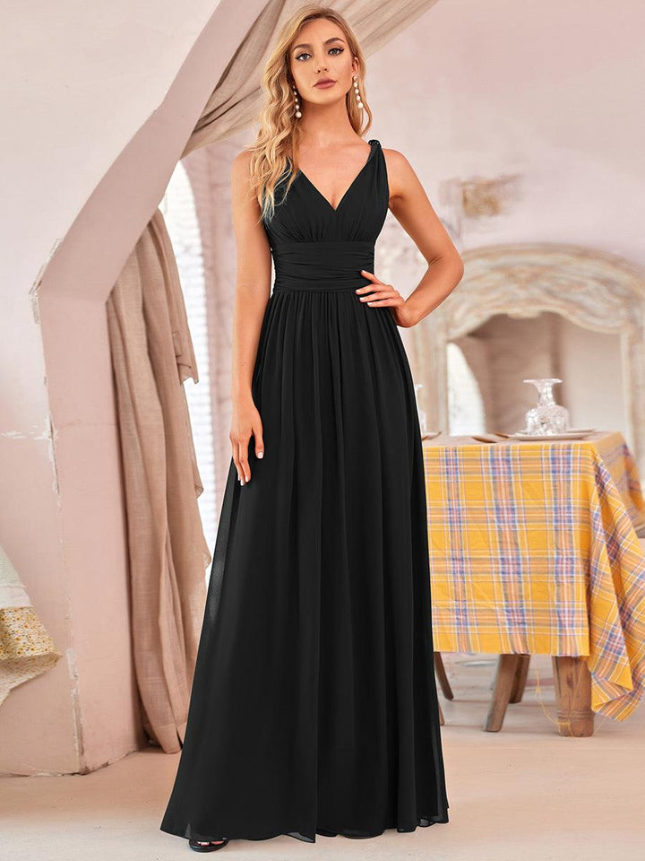 Sandrine | Robe de soirée plissée sans manches avec décolleté en V