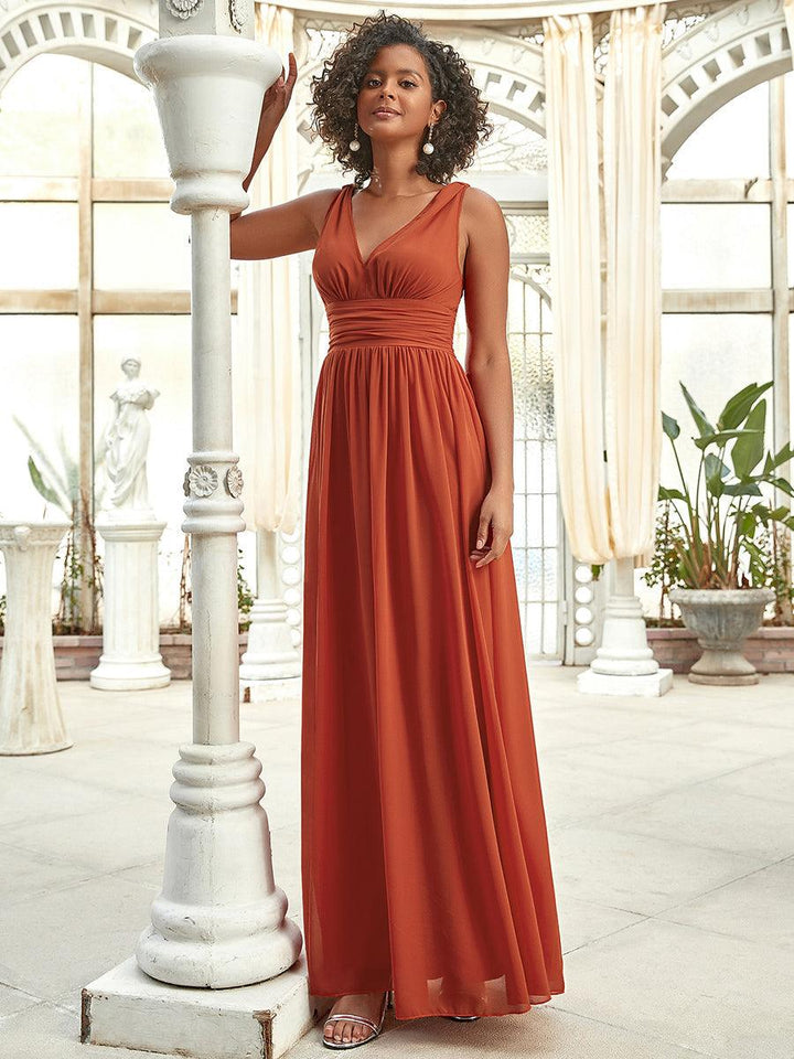 Sandrine | Robe de soirée plissée sans manches avec décolleté en V