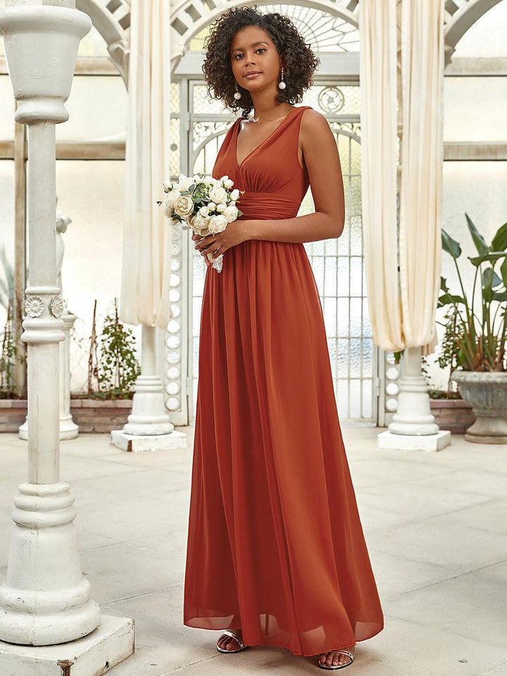 Sandrine | Robe de soirée plissée sans manches avec décolleté en V