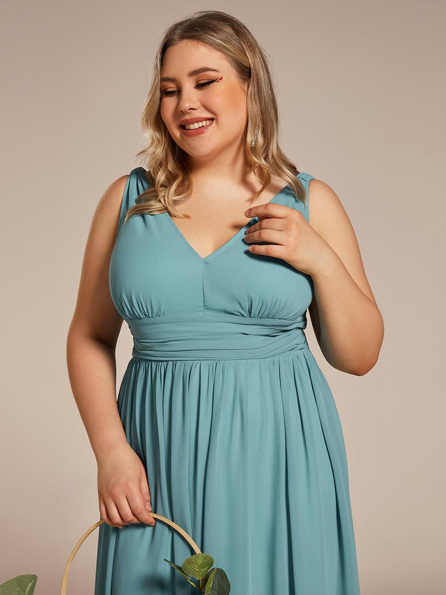 Sandrine | Robe de soirée plissée sans manches avec décolleté en V