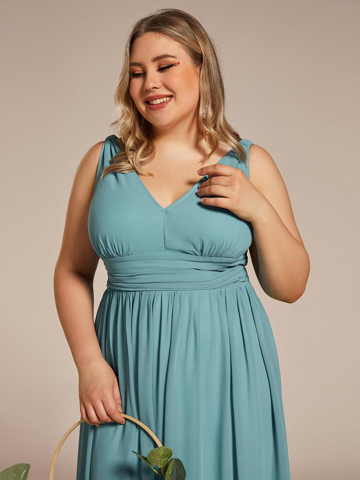 Sandrine | Robe de soirée plissée sans manches avec décolleté en V
