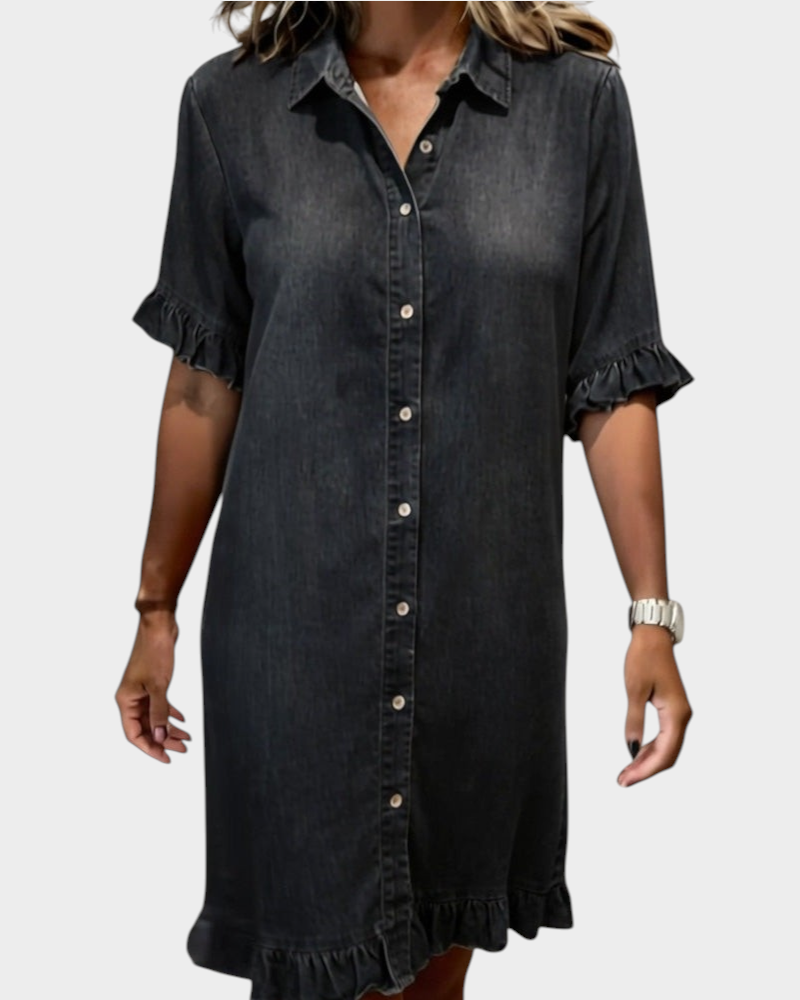 Aurore Paris charcoal grey denim shirt dress with button front, collar, and ruffled sleeves and hem.